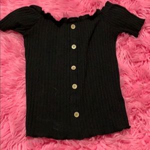 A cute off the shoulder shirt